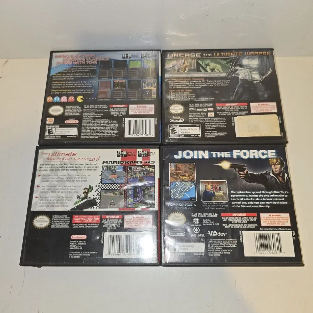 LOT OF 4 NINTENDO DS CASES AND MANUALS ONLY - NO GAMES. Mariokart  Wolverine